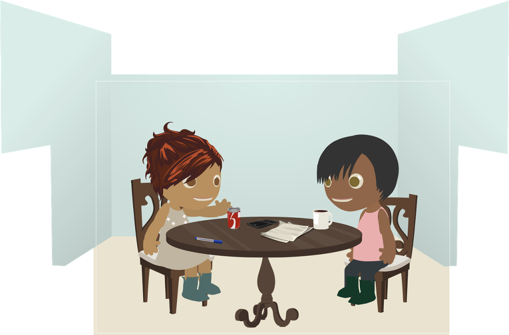 A cartoon drawing of two people chatting at a table