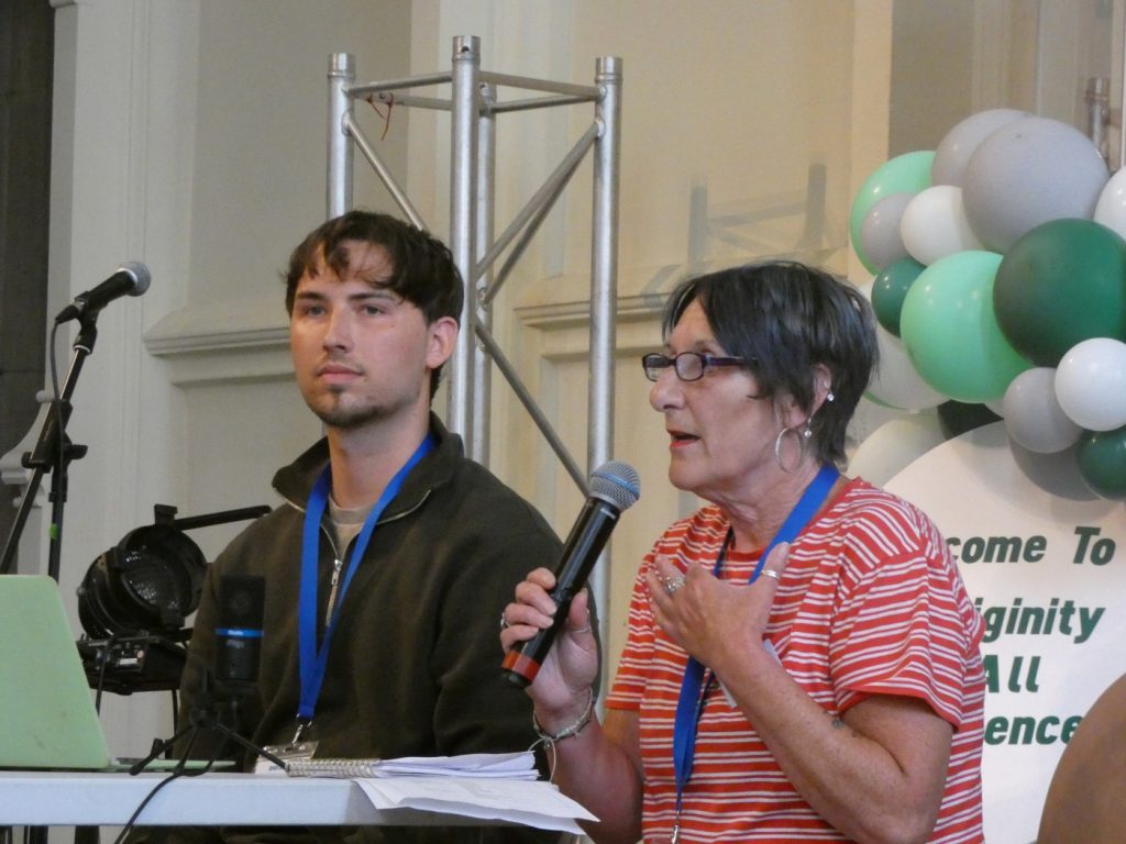 Dylan Eastwood and Tracey Herrington on stage at the Dignity For All conference in Leeds in June 2023
