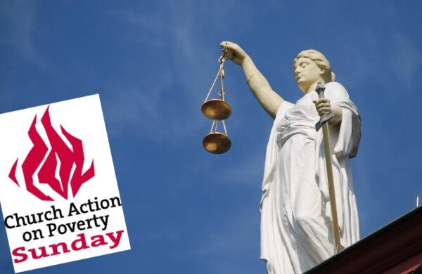 A stock image of a Lady Justice statue, with the Church Action on Poverty logo alongside
